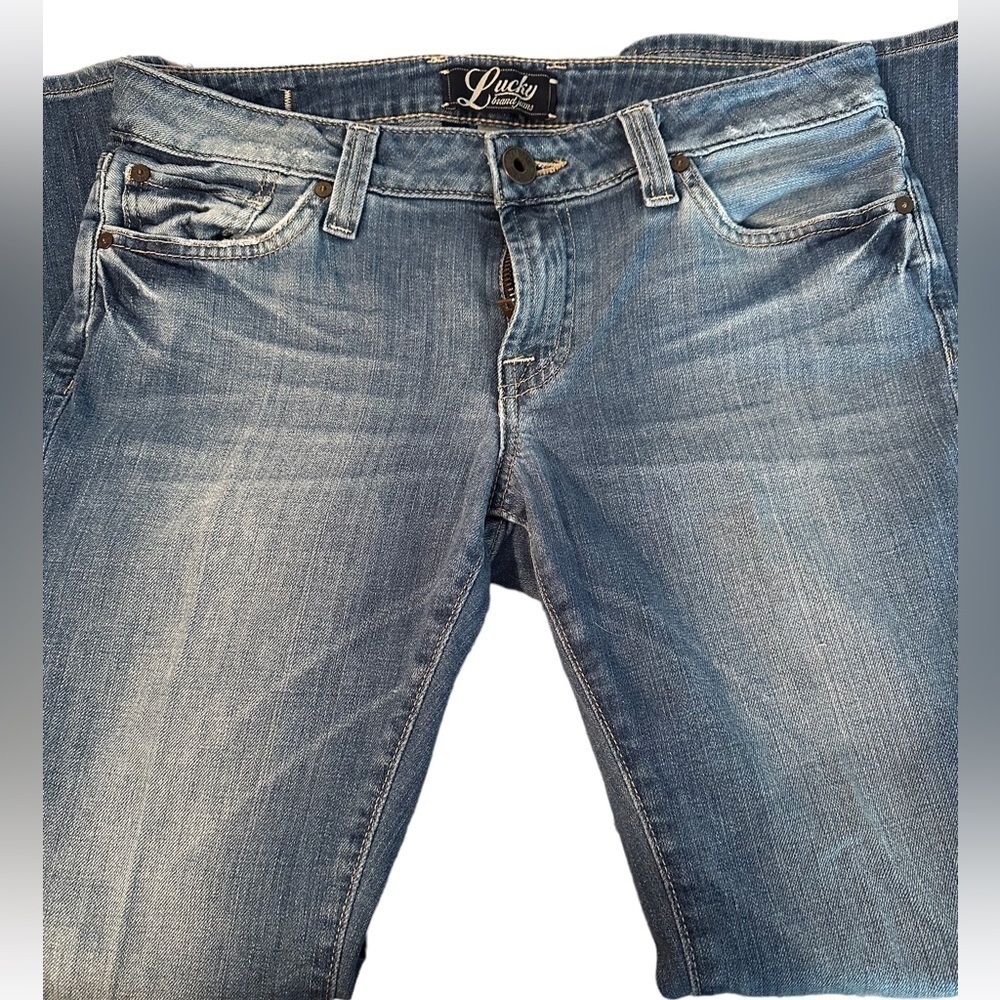 Lucky Brand women’s distressed boot cut jeans. Size 8/29.